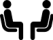 two people sitting two people sitting